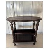 Antique side table with book/magazine rack...