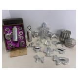 Vtg Aluminum cake decorator & cookie cutters....