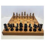 Vtg Carved wood chess set with resin tops...