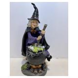 Witch crafters Halloeen wicked witch stirring..