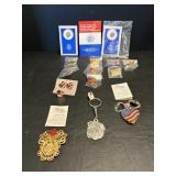 USA pins, Bulldog key chain, Tidings of Love pins.