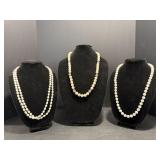 Faux pearl necklaces