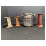Wooden spools with flower jar with stand
