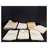 Embroidered pillw cases, table clothes & misc