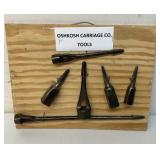 Antique Oshkosh carriage tools