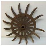 Antique iron cultivator wheel