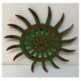 Antique iron cultivator wheel
