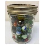 Jar of vintage marbles