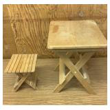 Two small folding wooden stools