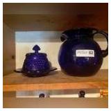 Cobalt Blue Glass Pitcher, Butter Plate With Grape Design Lid, (2) Cobalt Blue Cruets & (1) Amber Glass Cruet