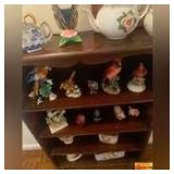 Contents On Shelf:  Tea Pots & Figurines