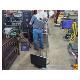 Vizio Flat Screen Television, Floor Lamp, CD Holder