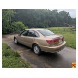 2001 GM Saturn 4-Door Sedan with 170,000 miles; VIN 1G8JU52F81Y579162
