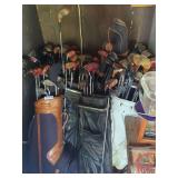 Collection of Golf Clubs and Bags
