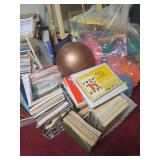 Assorted Children's Books And Exercise Ball