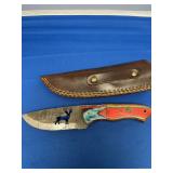 Custom Fixed Blade Knife with Pattern Welded Damascus Steel Blade, Cutout Deer Motif, Multi-Color Pakkawood Handle, and Leather Sheath