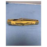 Schrade Scrimshaw 8OTWE Folding Pocket Knife with Bald Eagle Handle Graphic