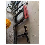 Shop Equipment Assortment Including Shop Vac, Folding Sawhorses, and PVC Fittings