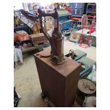 Cast Iron Hand-Crank Liquid Pump Mounted on Metal Tank