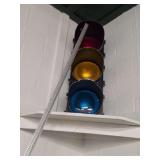 Three-Section Traffic Light Fixture with Red, Yellow, and Blue Lenses