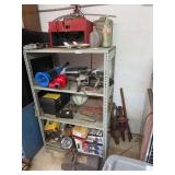 Assorted Automotive Parts, Accessories, and Electronics on Shelving Unit