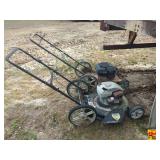 Two Push Lawn Mowers