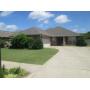 DICK CHITTAM REALTY & JOHN STEWART AUCTION CO. 4 BEDROOM BRICK HOME, ATTACHED 2 CAR GARAGE & LOT