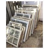 25 assorted vintage wood frame windows