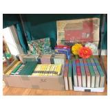 Books & household under table