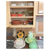 Dishes in cabinet & on counter