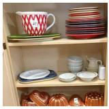 Dishes & copper molds on 3-shelves