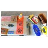 All on table:  ear plugs, cones, Tonka, fishing