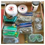 7-pair of goggles, 8- grinding rocks & can of flux