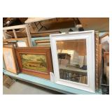 Pictures & Frames sitting on bench