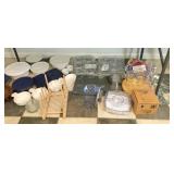 Cookie sheets & misc. kitchen items under table