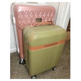 2 pc - plastic roll-a-round luggage