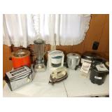 group of small appliances on table