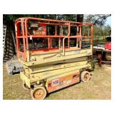 JLG scissor lift - needs batteries & has a short