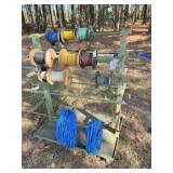 wire dispensing rack on wheels and contents
