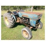 Long tractor-starts, runs, operates, has fuel leak
