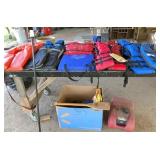 11 life vests(some new) ,2 cushions, tank,light