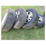 set of 4 Ford rims w Goodyear Wrangler LT275/65R18