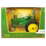 JD Model A w/ man  Diecast metal tractor