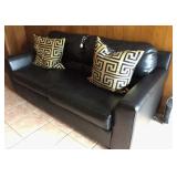 leather covered sofa  83 x 40