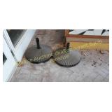 two umbrella bases plastic