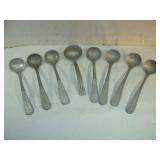 Eight Laddles or Large Spoons with Dressing Text