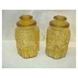 Two Amber Glass Cannisters