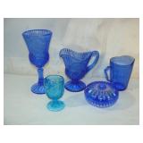Five Blue Glass Pieces