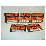 Five Plastic No Hunting or Trespassing Signs