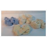 Set of 4 knitted baby booties